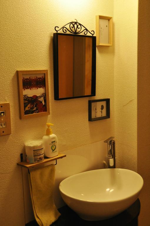 Santana Guest House Osaka Bagian luar foto